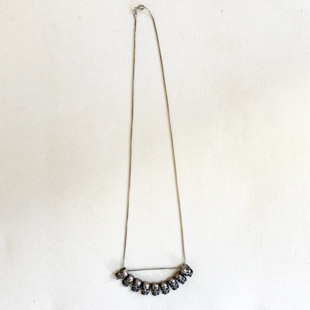 Awesome 8 Silver skulls necklace and charm